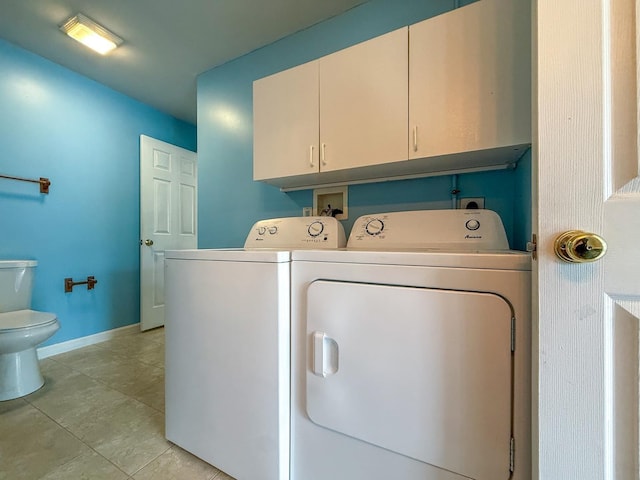 491 Mammoth Rd Unit 7, Londonderry, NH 03053 - laundry area with washer and clothes dryer and light tile patterned flooring