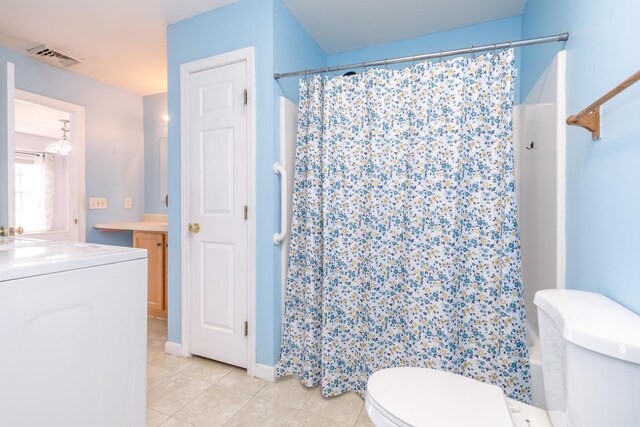 491 Mammoth Rd Unit 7, Londonderry, NH 03053 - full bathroom with washer / clothes dryer, vanity, a shower with curtain, and tile patterned floors