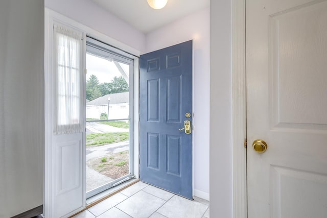 491 Mammoth Rd Unit 7, Londonderry, NH 03053 - foyer featuring light tile patterned flooring and baseboards