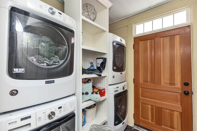 102 W Merrimack St Unit 1, Manchester, NH 03101 - laundry room with stacked washer and clothes dryer