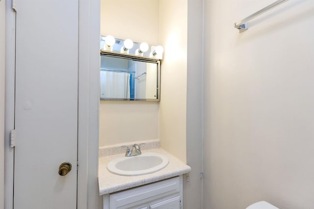 102 W Merrimack St Unit 1, Manchester, NH 03101 - full bathroom featuring vanity and toilet