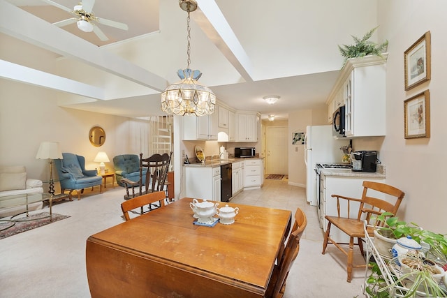 3 Chandler Dr, Atkinson, NH 03811 - dining area with a chandelier, a ceiling fan, and lofted ceiling