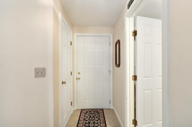 3 Chandler Dr, Atkinson, NH 03811 - entryway with baseboards and light tile patterned floors