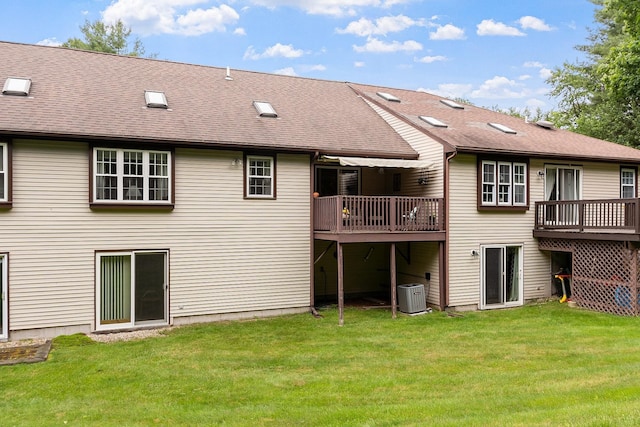 3 Chandler Dr, Atkinson, NH 03811 - rear view of house featuring a lawn, a wooden deck, and roof with shingles
