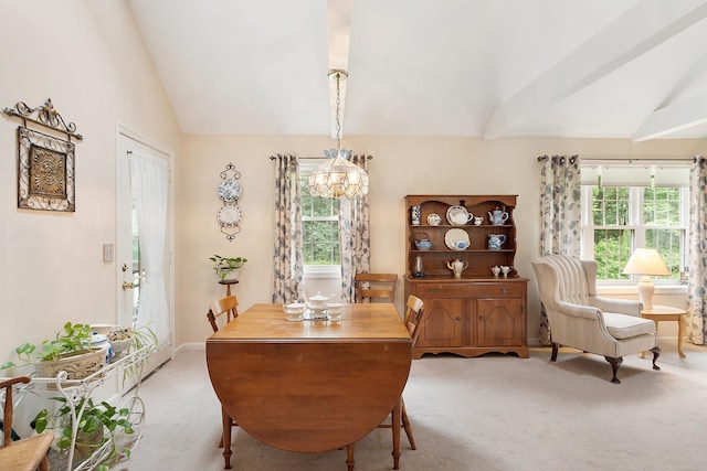 3 Chandler Dr, Atkinson, NH 03811 - dining space with vaulted ceiling, light colored carpet, plenty of natural light, and a chandelier