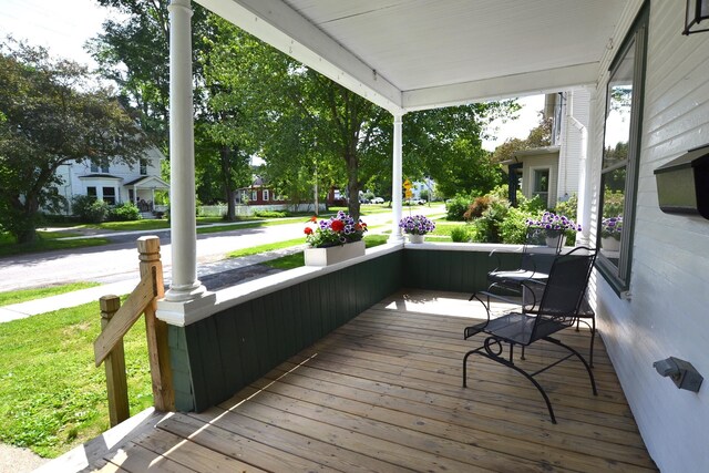 27 Randall St, Waterbury, VT 05676 - porch featuring a lawn