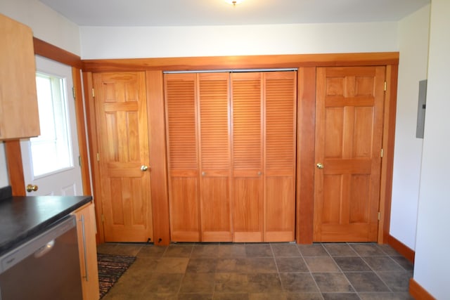 27 Randall St, Waterbury, VT 05676 - kitchen featuring dishwasher, dark countertops, and electric panel