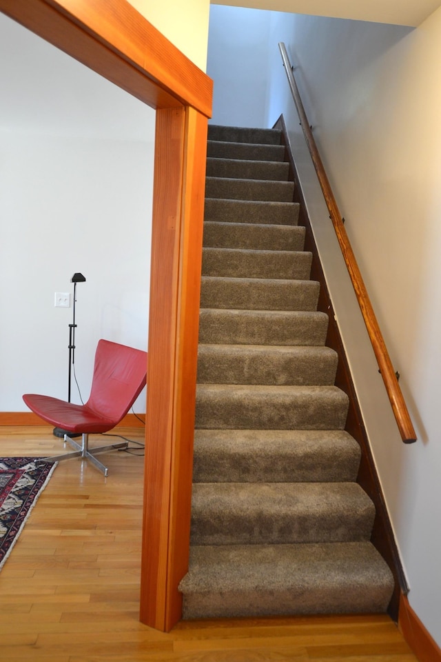 27 Randall St, Waterbury, VT 05676 - staircase featuring wood finished floors and baseboards