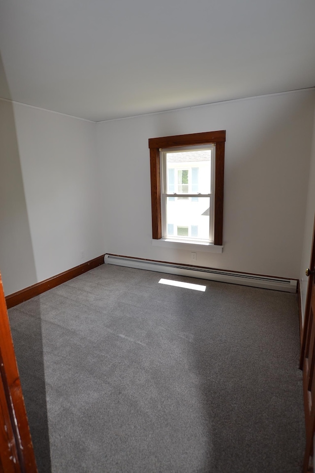 27 Randall St, Waterbury, VT 05676 - unfurnished room with carpet flooring and a baseboard radiator