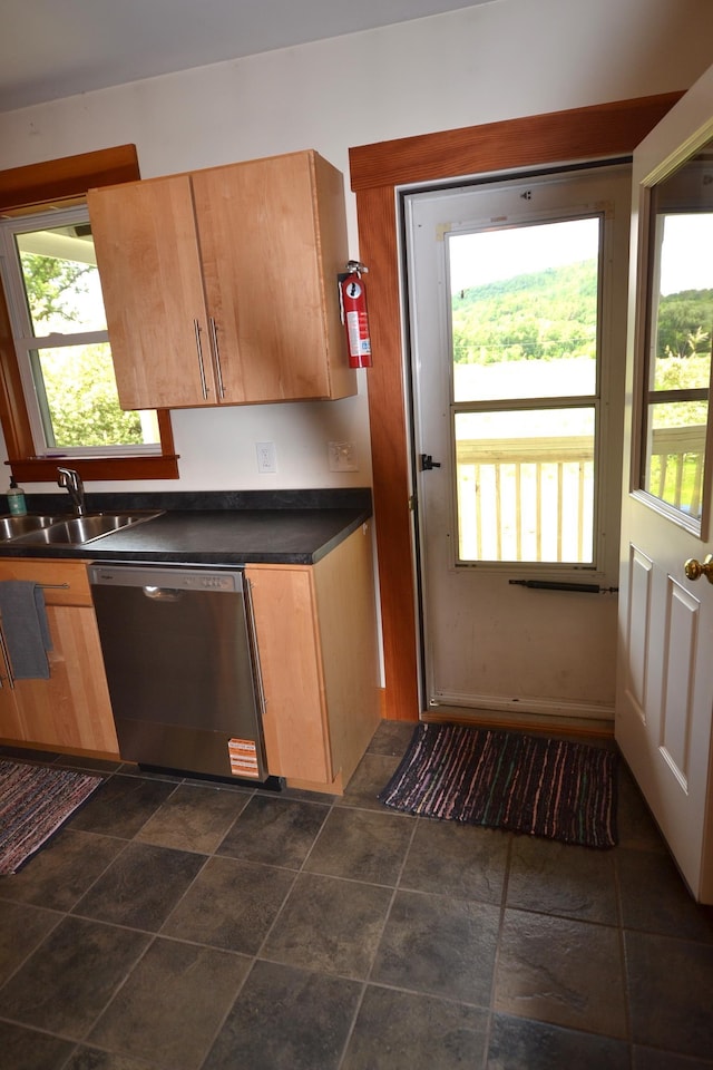 27 Randall St, Waterbury, VT 05676 - kitchen featuring dishwasher, dark countertops, and dark stone finish floors