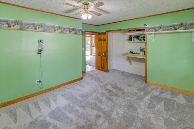 6 Goodbout Rd, Lincoln, NH 03251 - carpeted empty room with crown molding, a ceiling fan, and a textured ceiling