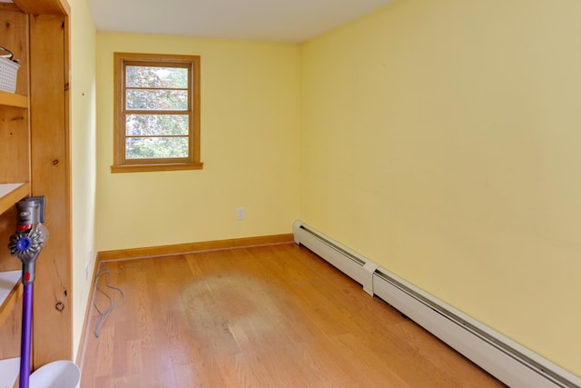 6 Goodbout Rd, Lincoln, NH 03251 - empty room featuring baseboard heating and light wood-type flooring
