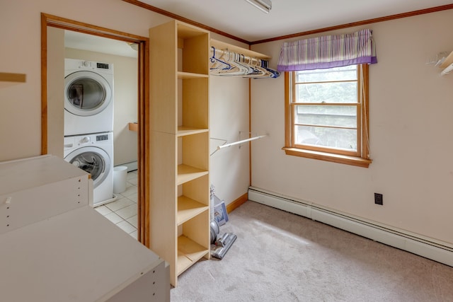 6 Goodbout Rd, Lincoln, NH 03251 - laundry area featuring estacked washer and dryer, a baseboard radiator, carpet floors, and ornamental molding