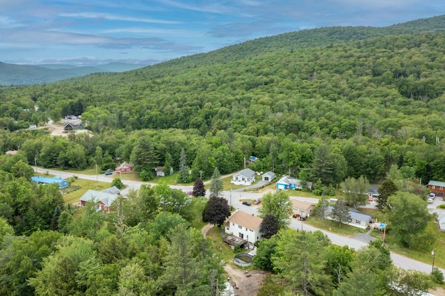 6 Goodbout Rd, Lincoln, NH 03251 - bird's eye view of a heavily wooded area and mountains