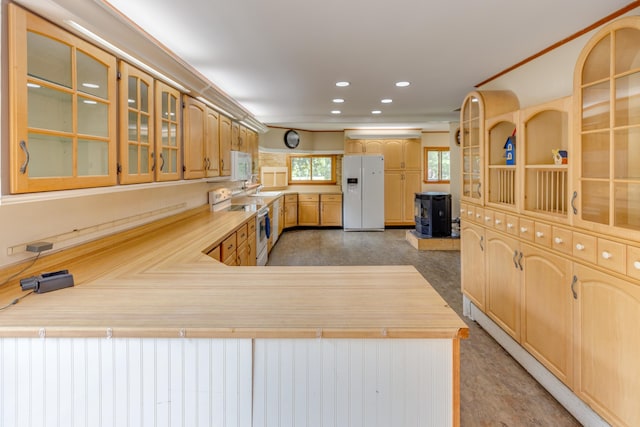 6 Goodbout Rd, Lincoln, NH 03251 - kitchen featuring white appliances, glass insert cabinets, light countertops, recessed lighting, and a peninsula