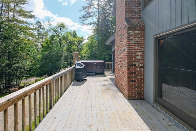 26 Country Xing, Ludlow, VT 05149 - wooden deck with a hot tub and view of scattered trees
