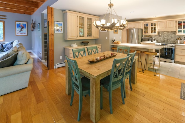 26 Country Xing, Ludlow, VT 05149 - dining area with a chandelier, light wood-style flooring, baseboard heating, recessed lighting, and beam ceiling