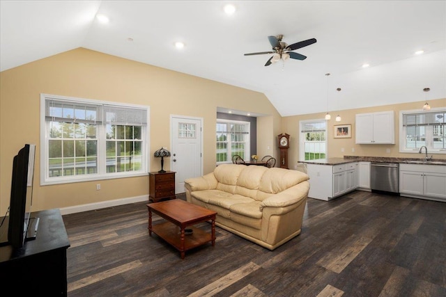5 Rolling Hills Dr, Tilton, NH 03276 - living area featuring lofted ceiling, ceiling fan, and dark wood-type flooring