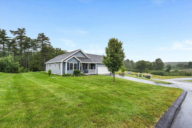 5 Rolling Hills Dr, Tilton, NH 03276 - ranch-style house featuring concrete driveway, a front lawn, and a garage