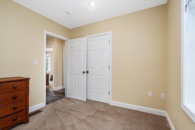 5 Rolling Hills Dr, Tilton, NH 03276 - carpeted bedroom with baseboards and a closet
