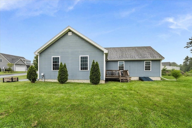 5 Rolling Hills Dr, Tilton, NH 03276 - rear view of property with a wooden deck, a yard, and a shingled roof