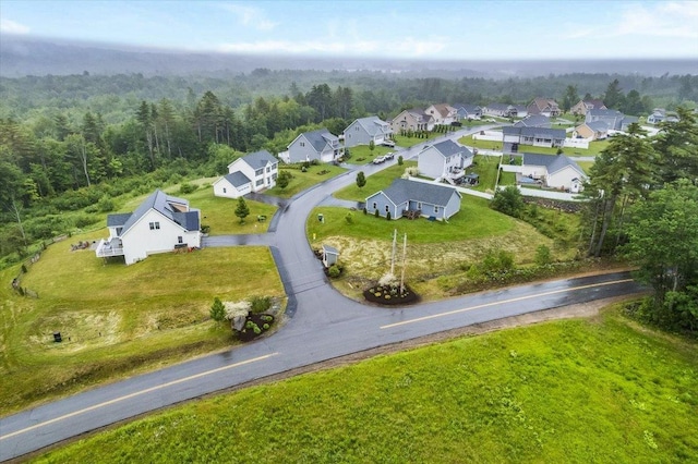 5 Rolling Hills Dr, Tilton, NH 03276 - aerial perspective of suburban area with a heavily wooded area