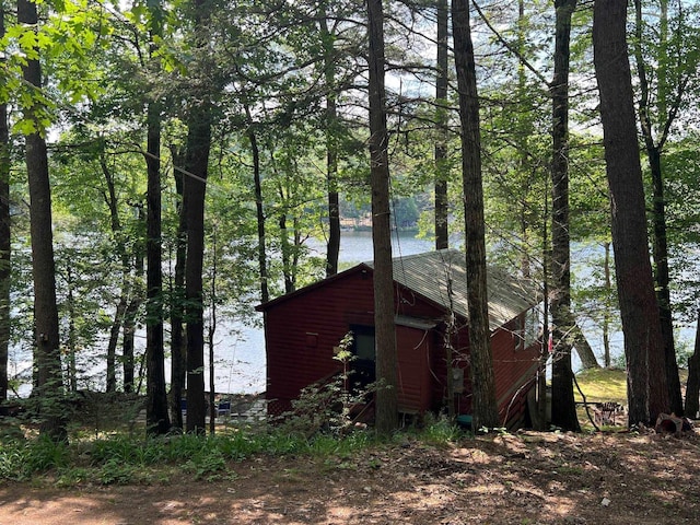 224 Nippo Ct, Barrington, NH 03825 - view of property exterior with an outbuilding