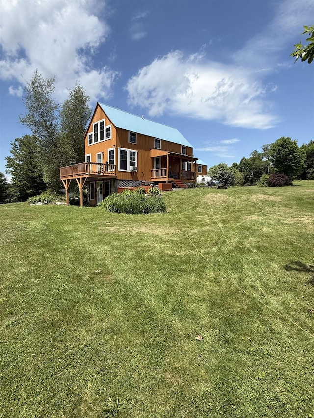 1442 Ridge Rd, Randolph, VT 05061 - back of house featuring a wooden deck and a lawn