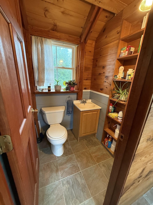 1442 Ridge Rd, Randolph, VT 05061 - half bath with wooden walls, wooden ceiling, vanity, and lofted ceiling