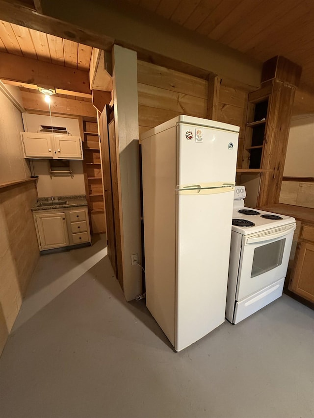 1442 Ridge Rd, Randolph, VT 05061 - kitchen with white appliances, a wooden ceiling with exposed beams, and finished concrete flooring