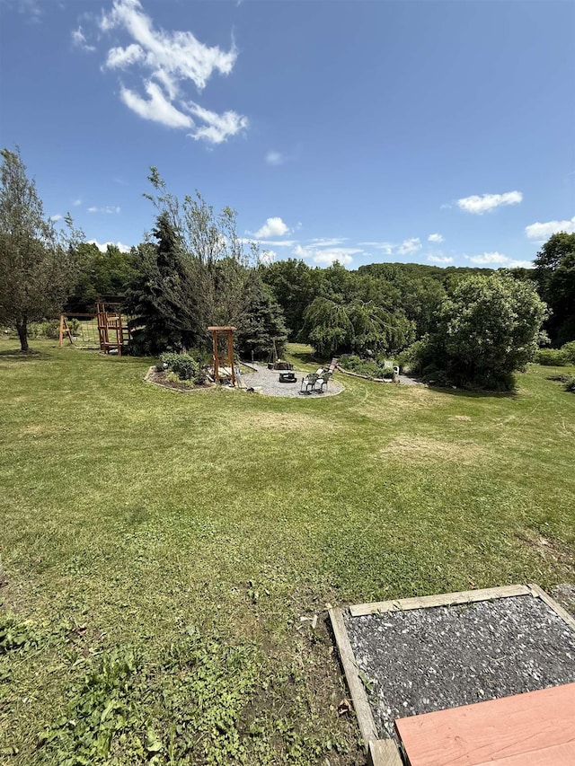 1442 Ridge Rd, Randolph, VT 05061 - view of grassy yard with an outdoor fire pit