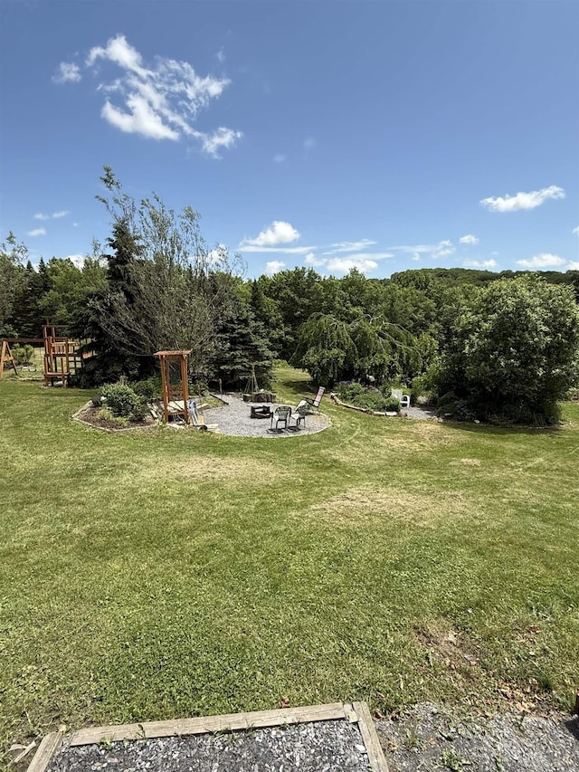 1442 Ridge Rd, Randolph, VT 05061 - view of green lawn featuring an outdoor fire pit