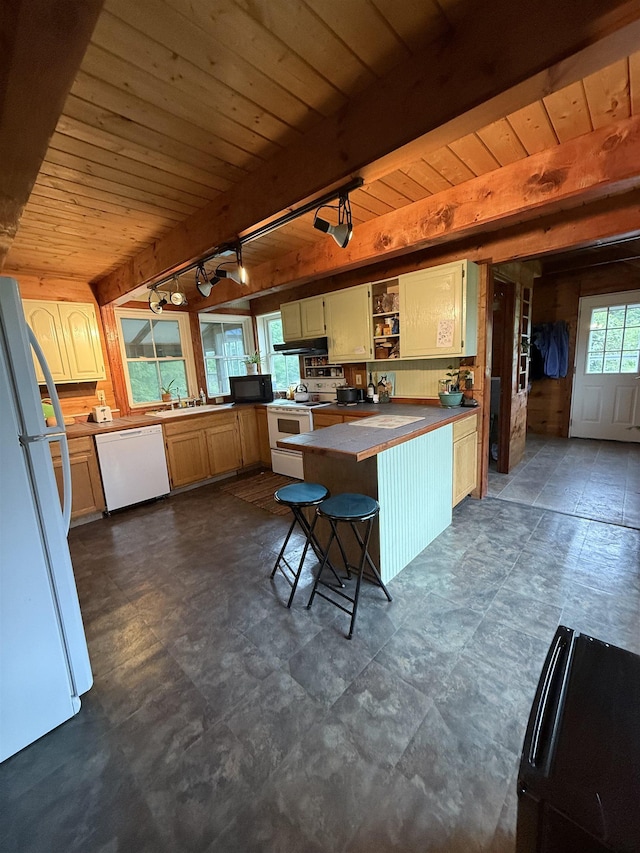 1442 Ridge Rd, Randolph, VT 05061 - kitchen with white appliances, a wood ceiling with exposed beams, rail lighting, open shelves, and a peninsula