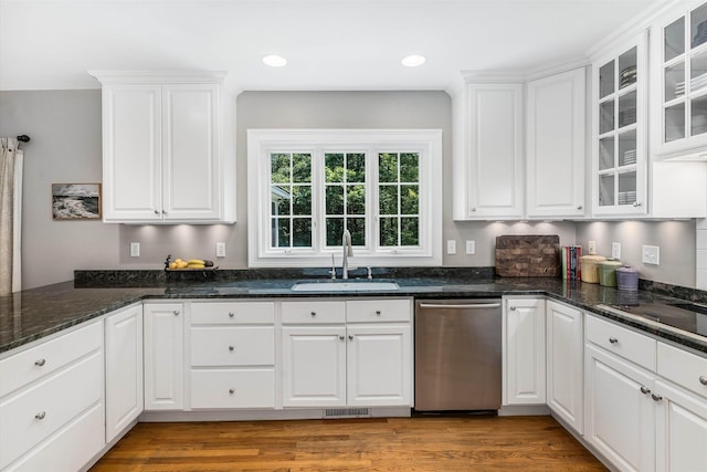 11 Mcafee Farm Rd, Bedford, NH 03110 - kitchen with dishwasher, white cabinets, glass insert cabinets, light wood-style flooring, and dark stone counters