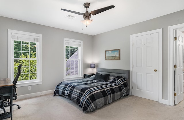 11 Mcafee Farm Rd, Bedford, NH 03110 - carpeted bedroom featuring multiple windows, ceiling fan, and an office area