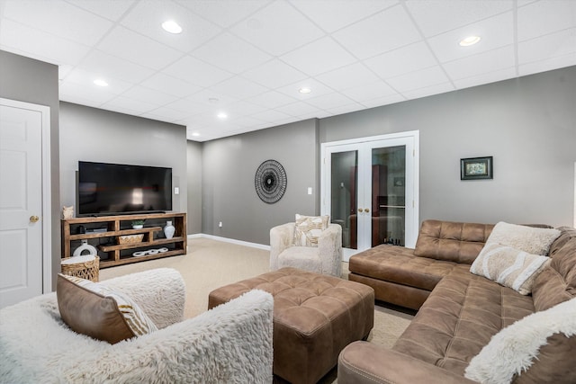 11 Mcafee Farm Rd, Bedford, NH 03110 - living room featuring french doors, carpet floors, a drop ceiling, and recessed lighting