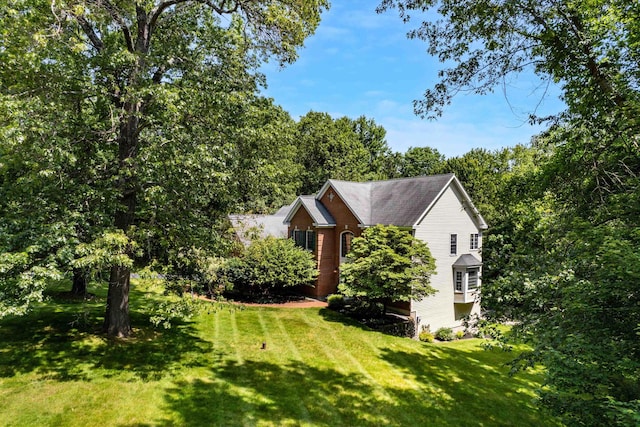 11 Mcafee Farm Rd, Bedford, NH 03110 - view of side of home featuring a lawn