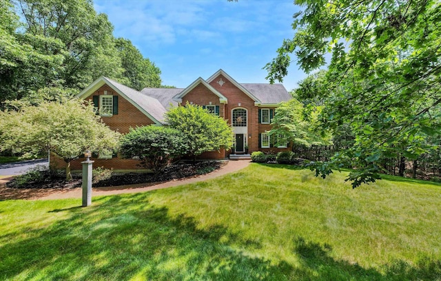 11 Mcafee Farm Rd, Bedford, NH 03110 - view of front of home with a front lawn and brick siding