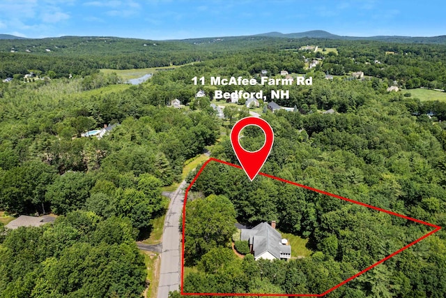 11 Mcafee Farm Rd, Bedford, NH 03110 - aerial view of property and surrounding area featuring property boundaries highlighted