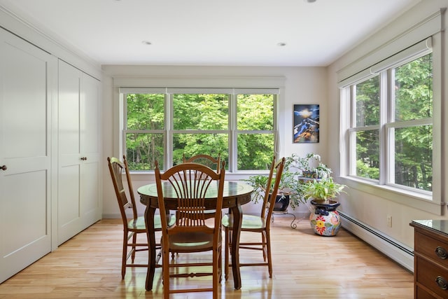 204 Mary Dr, Richmond, VT 05477 - dining space with a baseboard radiator and light wood finished floors