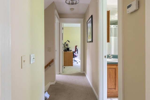204 Mary Dr, Richmond, VT 05477 - hallway featuring light carpet and an upstairs landing