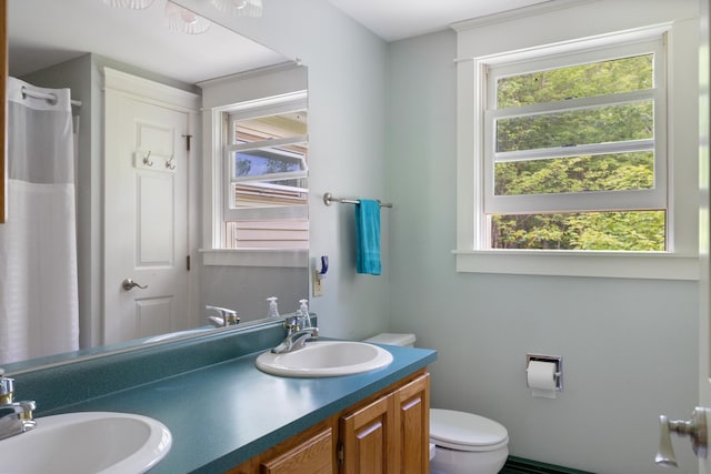 204 Mary Dr, Richmond, VT 05477 - bathroom featuring plenty of natural light and double vanity
