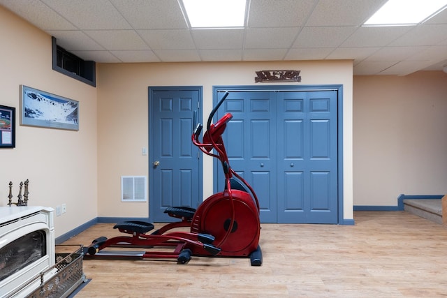 204 Mary Dr, Richmond, VT 05477 - exercise room with wood finished floors and a paneled ceiling