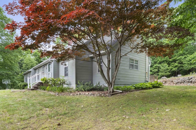 2 Ridgewood Dr, Kingston, NH 03848 - view of side of property featuring a lawn