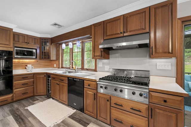 2 Ridgewood Dr, Kingston, NH 03848 - kitchen featuring black appliances, under cabinet range hood, dark wood-type flooring, and healthy amount of natural light