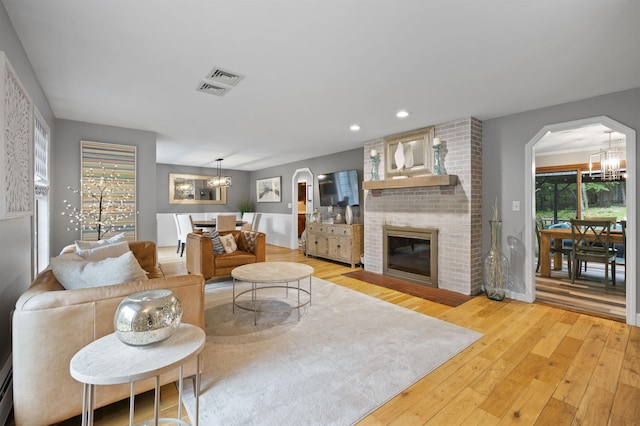2 Ridgewood Dr, Kingston, NH 03848 - living area featuring a chandelier, healthy amount of natural light, hardwood / wood-style floors, and recessed lighting