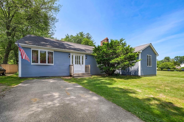17 N Ave, Plaistow, NH 03865 - view of front of property featuring a chimney and driveway