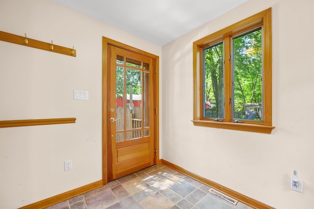 17 N Ave, Plaistow, NH 03865 - doorway featuring healthy amount of natural light and stone finish floors