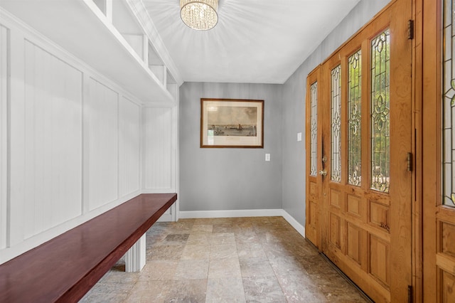 17 N Ave, Plaistow, NH 03865 - mudroom featuring a chandelier and baseboards