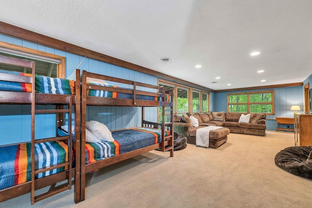 679 Kearsarge Rd, Conway, NH 03860 - carpeted living area featuring recessed lighting, wooden walls, and a textured ceiling